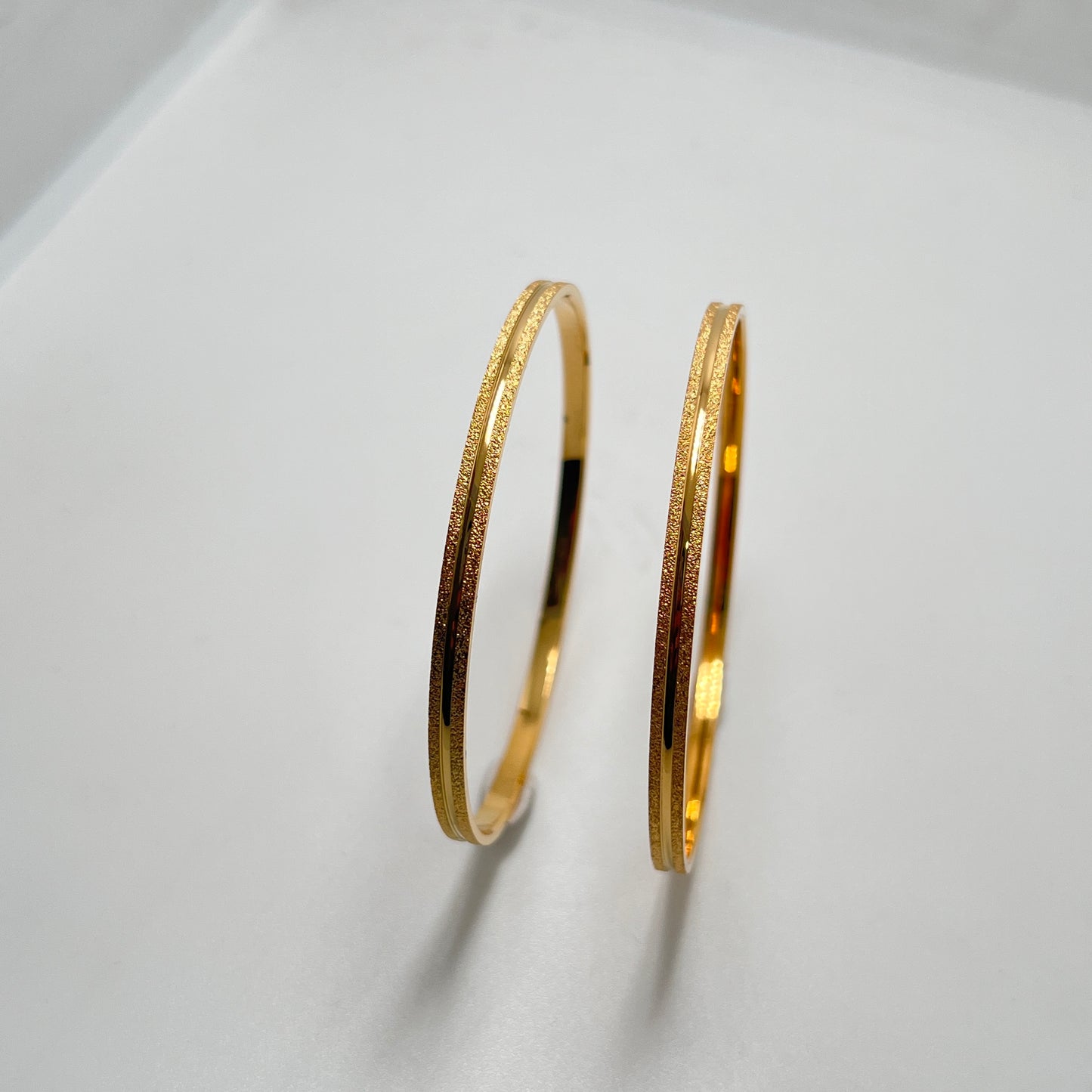 Ladies Cutting Bangles Gold Finish