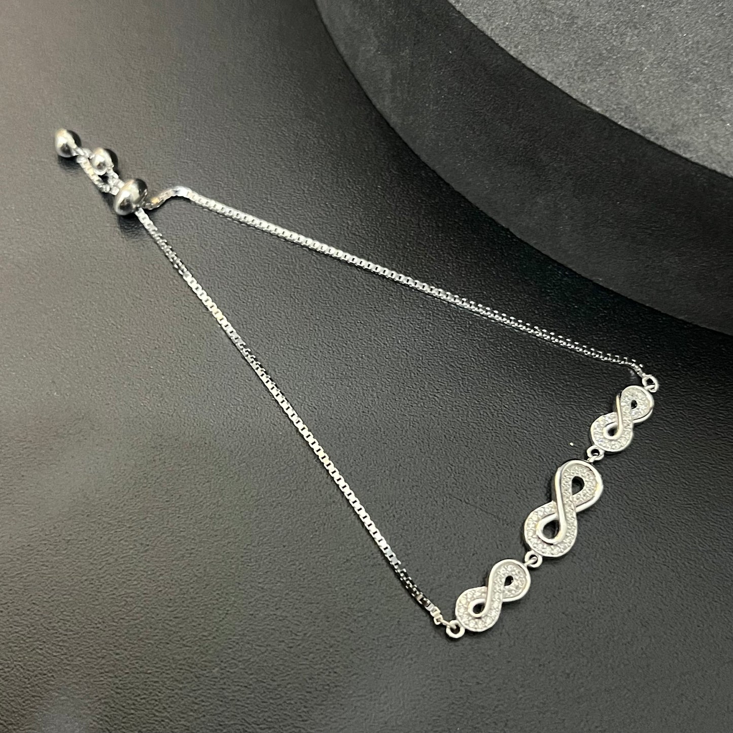 Silver Ladies Infinity Bracelet Push Adjustable Lock