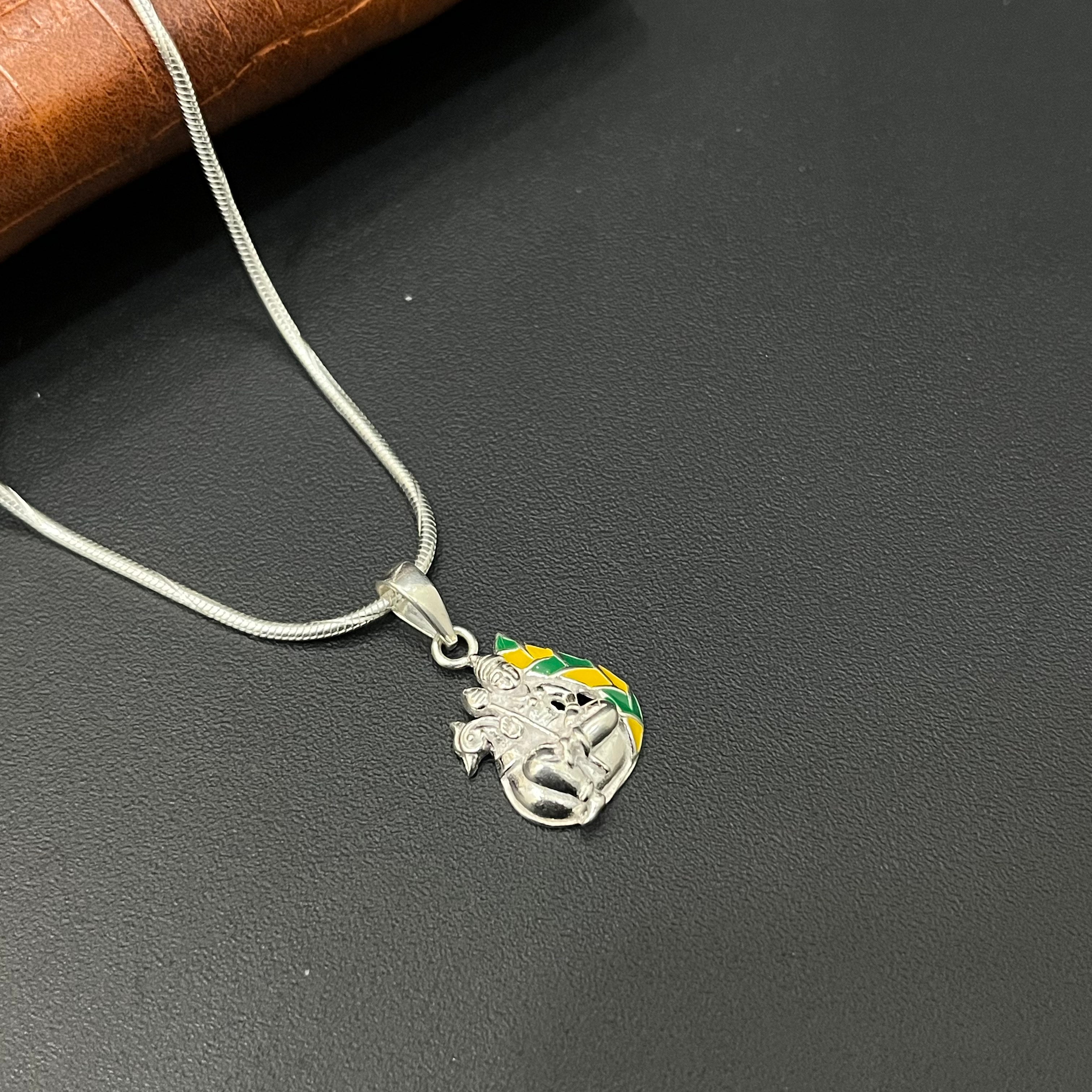 Silver Murgar Pendant & Peacock