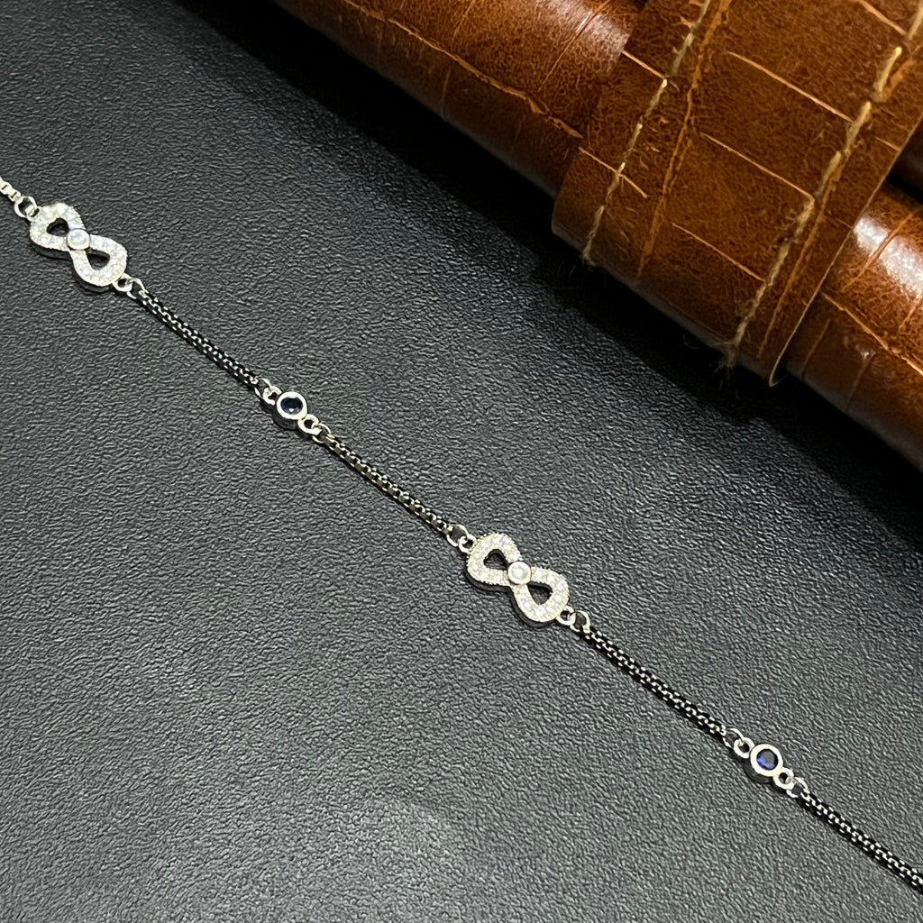 Silver Ladies Bracelet Triple Infinity Blue Stone 925
