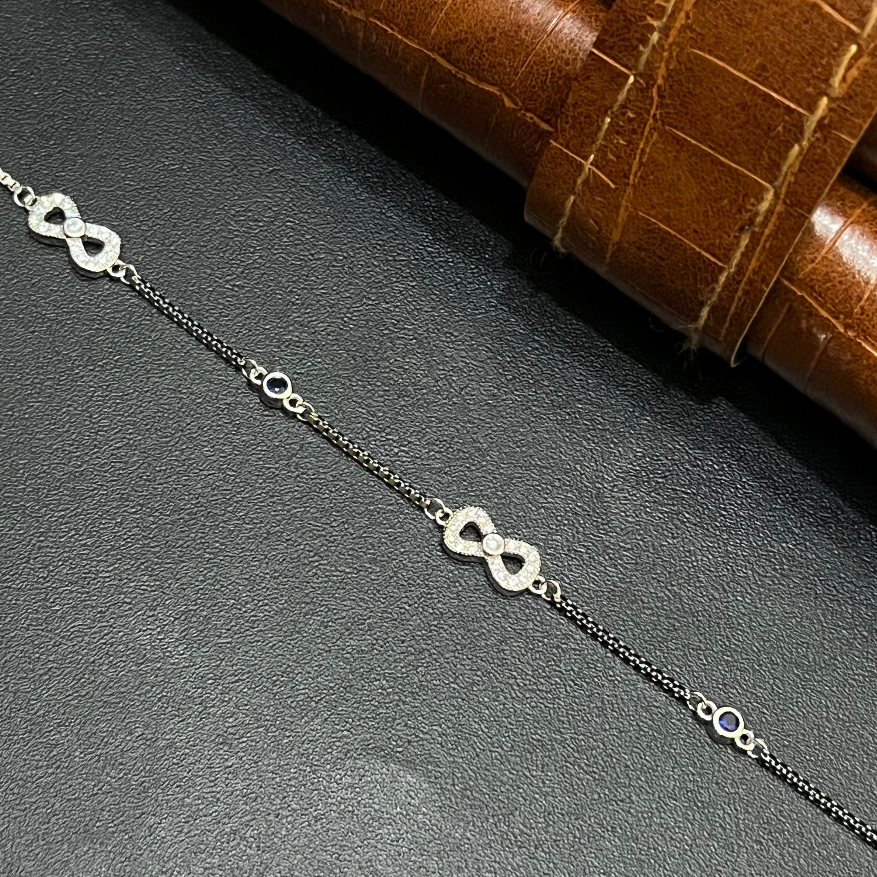 Silver Ladies Bracelet Triple Infinity Blue Stone 925