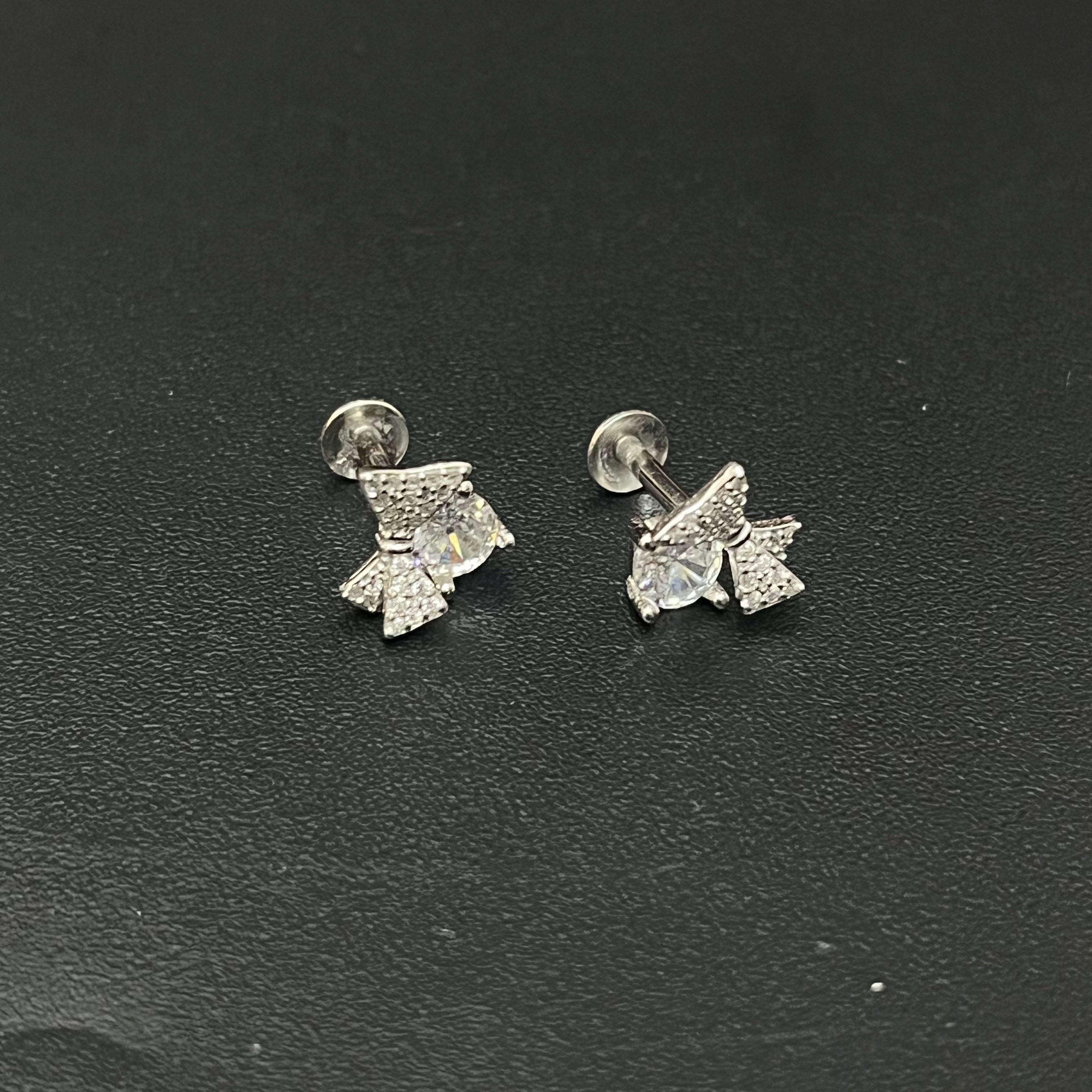Silver Ladies Stud White Bow Stone