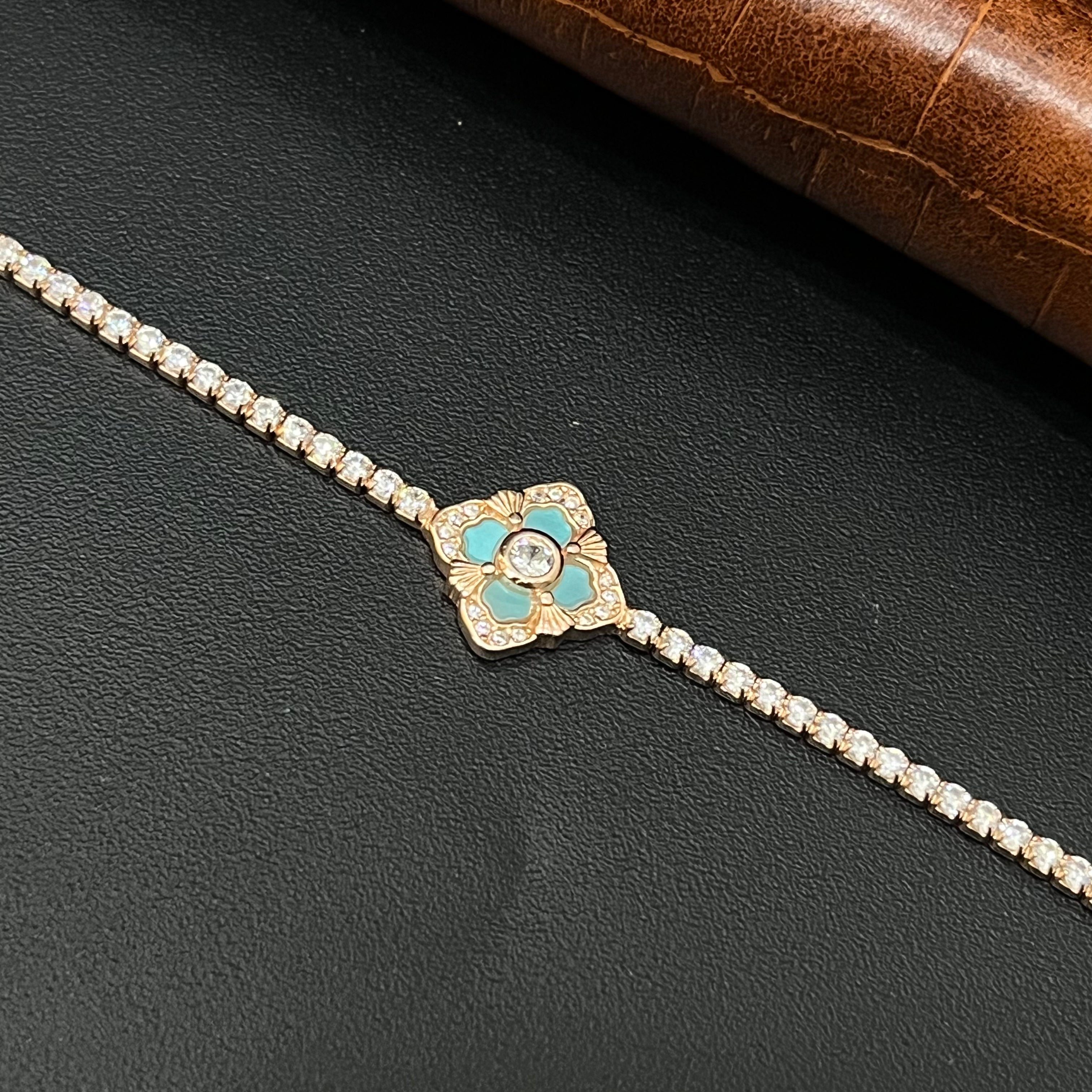 Silver Ladies Bracelet Flower Blue AD Stones