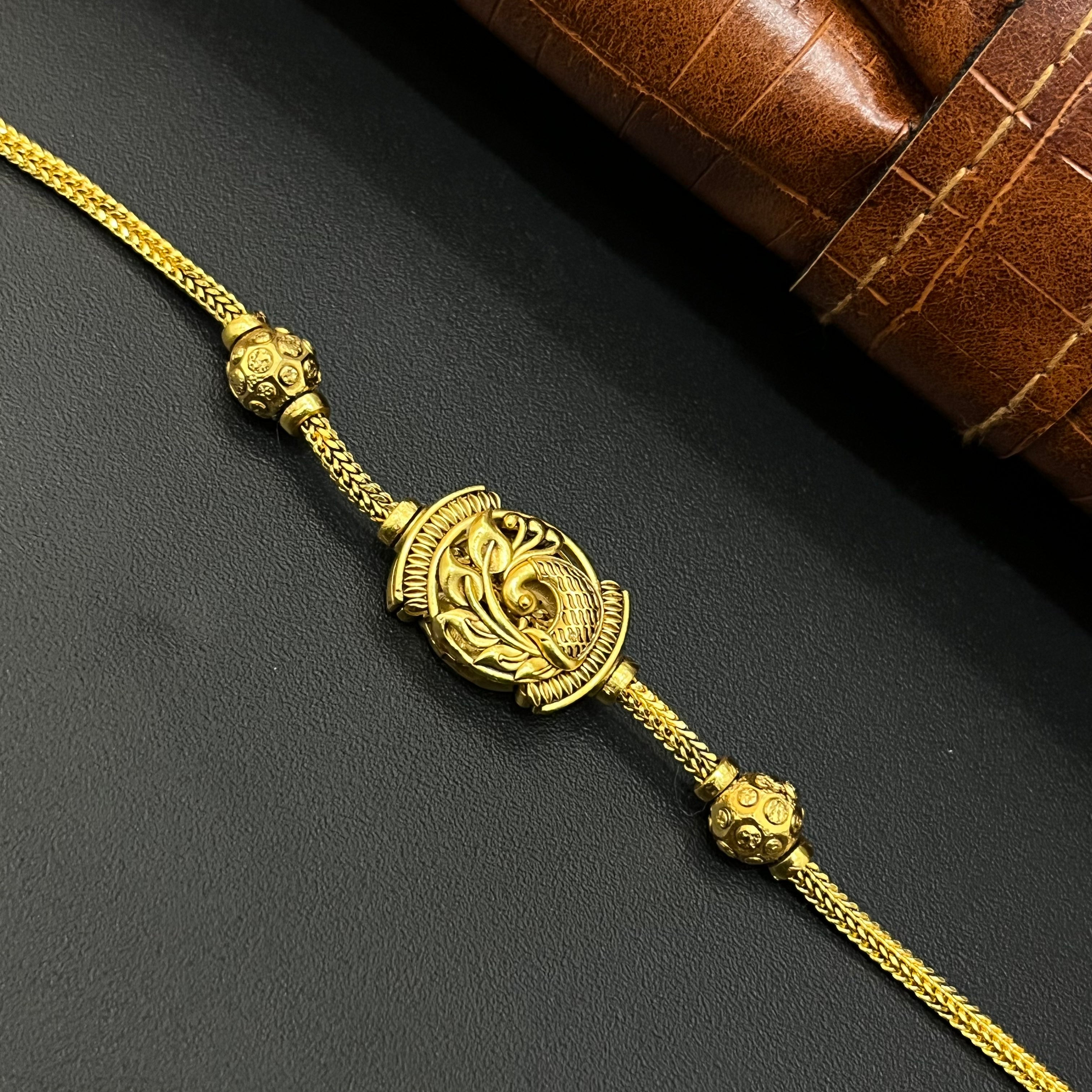 Silver Gold Finished Thali Saradu Peacock Curvez