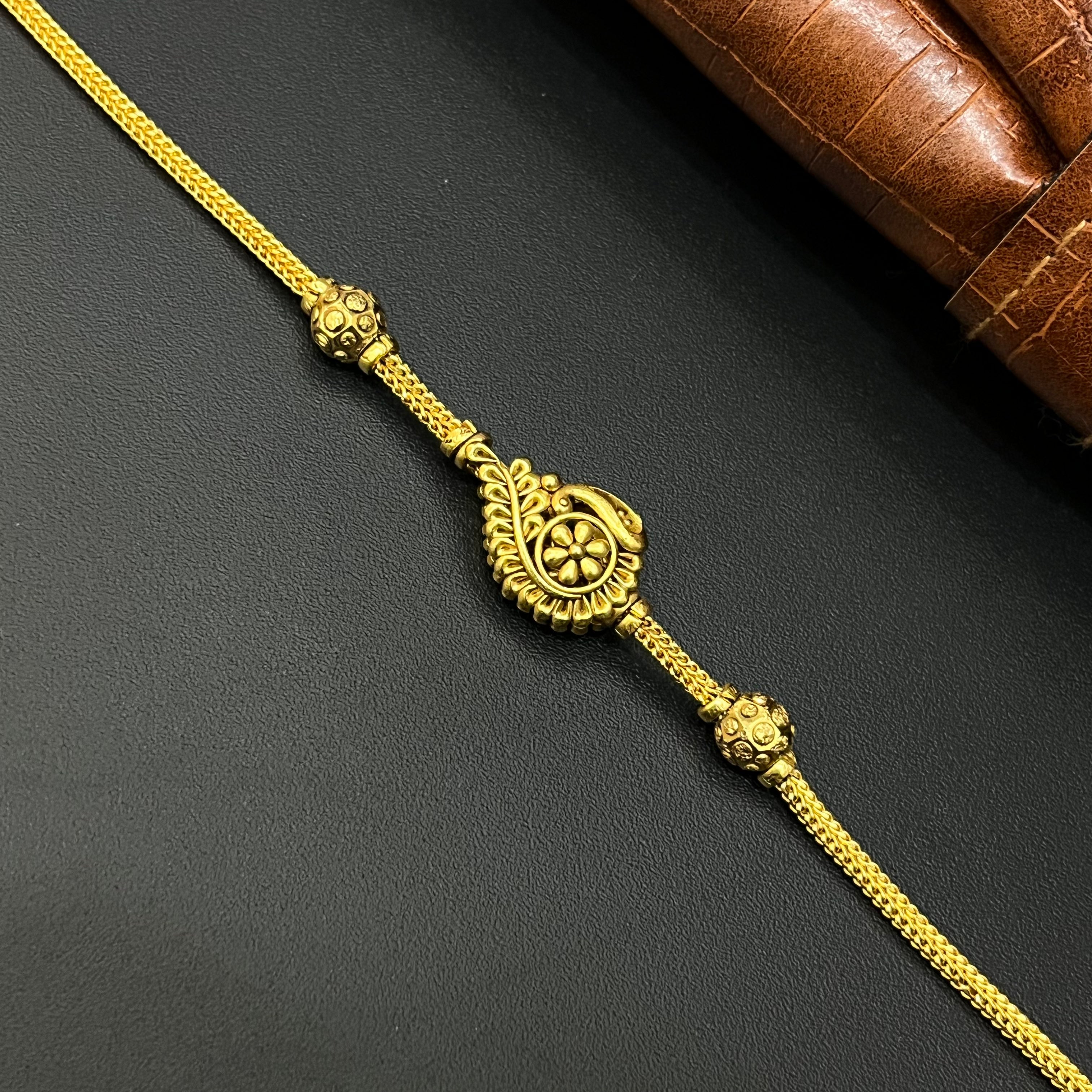 Silver Gold Finished Thali Saradu Floral Peacock
