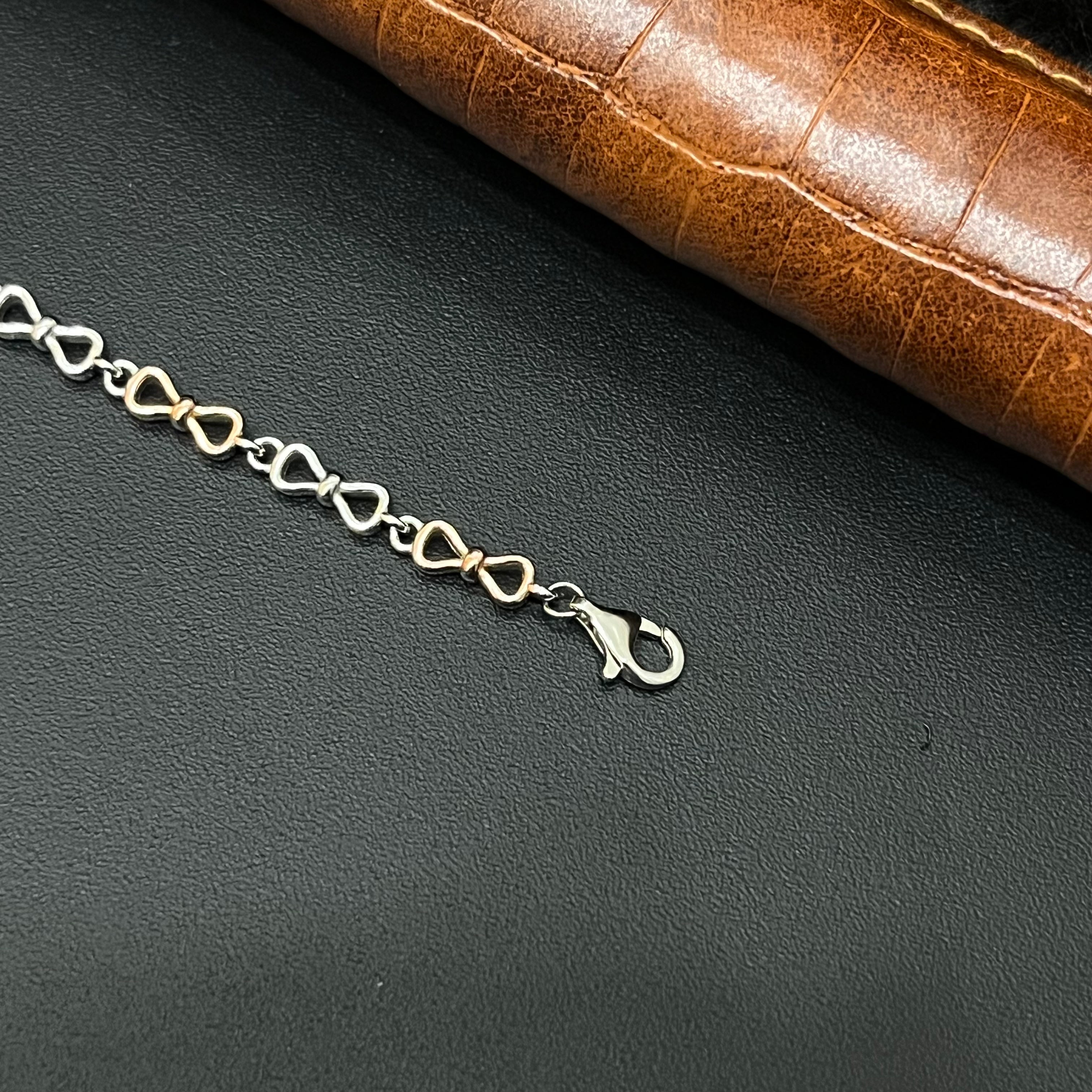 Silver Ladies Bracelet 3 Fower Bow Two Finish