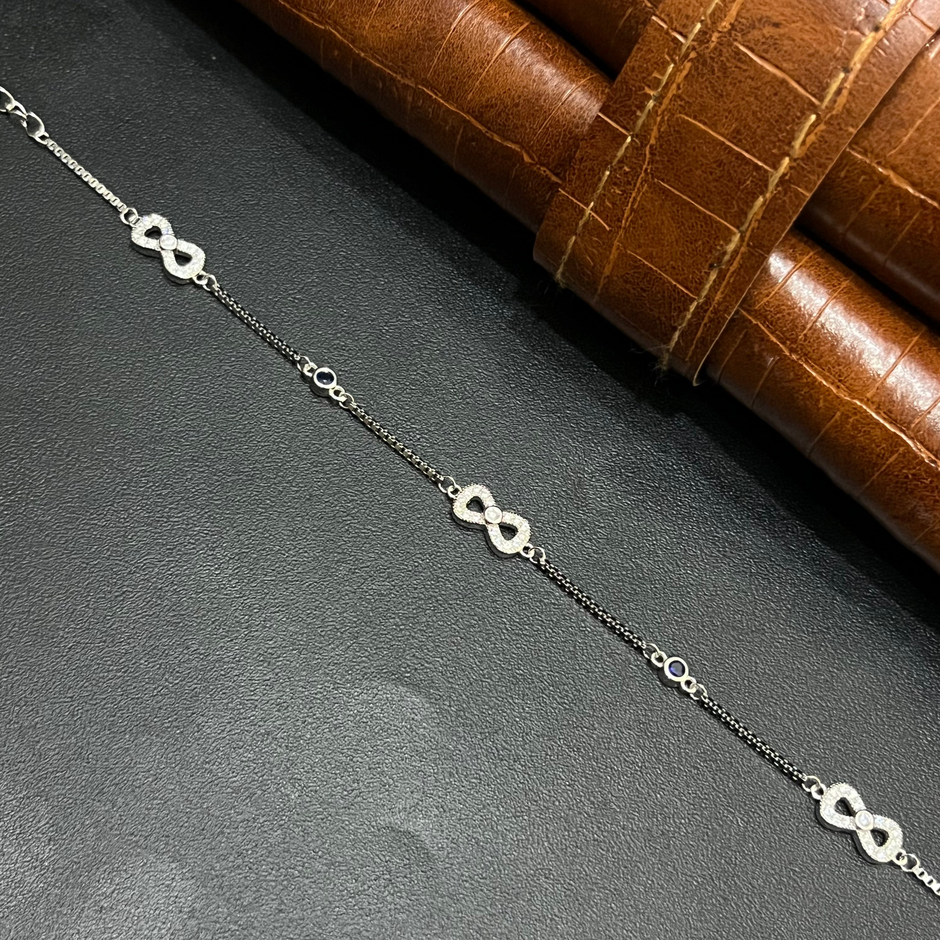 Silver Ladies Bracelet Triple Infinity Blue Stone 925