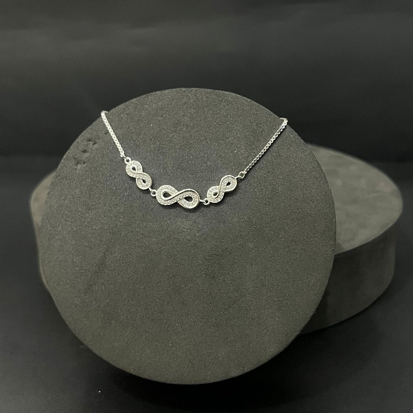 Silver Ladies Infinity Bracelet Push Adjustable Lock