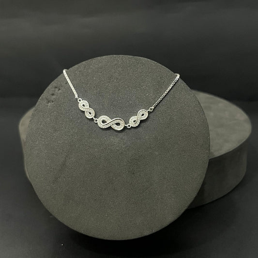 Silver Ladies Infinity Bracelet Push Adjustable Lock